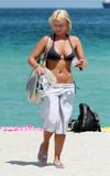 Brooke Hogan in blue bikini top in Miami Beach