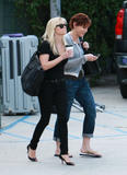 th_72234_Preppie_-_Reese_Witherspoon_stops_for_coffee_in_Santa_Monica_-_Jan._16_2010_868_122_163lo.jpg