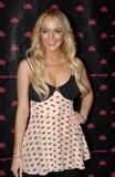 Lindsay Lohan shows nice cleavage at Fornarina Party at the Carrousel du Louvre in Paris