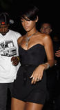 Rihanna leggy and cleavagy in small black dress in West Hollywood