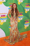 http://img216.imagevenue.com/loc453/th_21853_celebrity_paradise.com_TheElder_MileyCyrus64_122_453lo.jpg